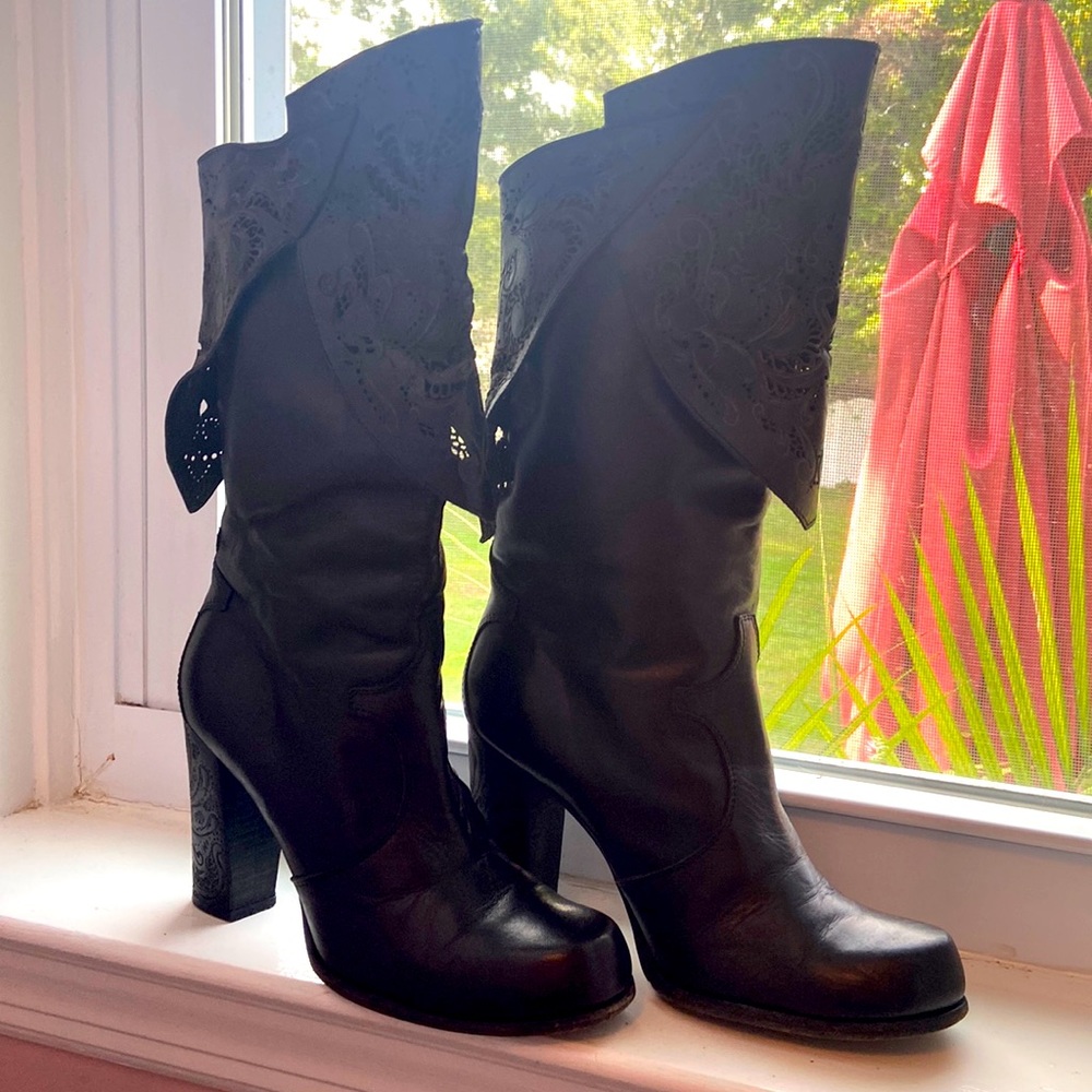 Black leather boots size 9.5 however run small 1/2 size